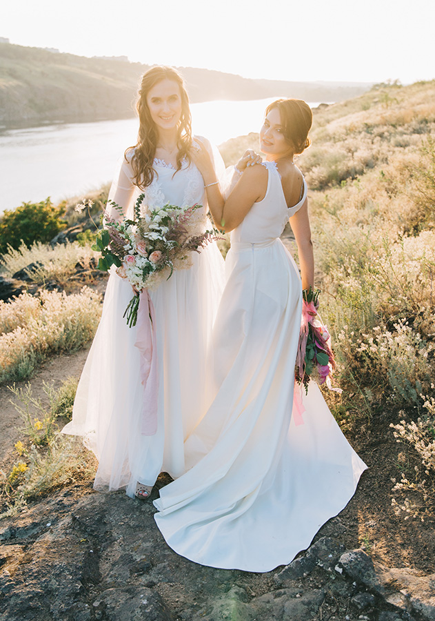 Two brides at golden hour outside