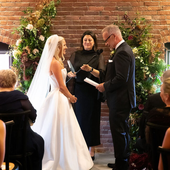 Couple exchanging wedding vows