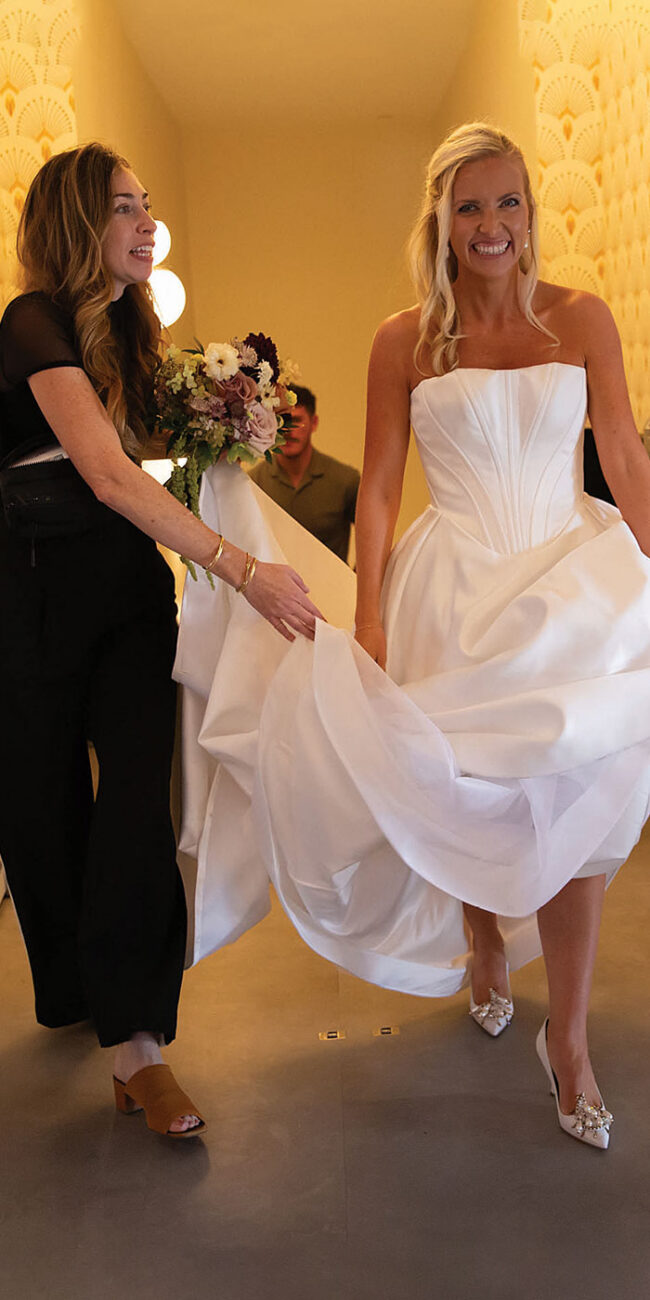 Bride walking down hallway