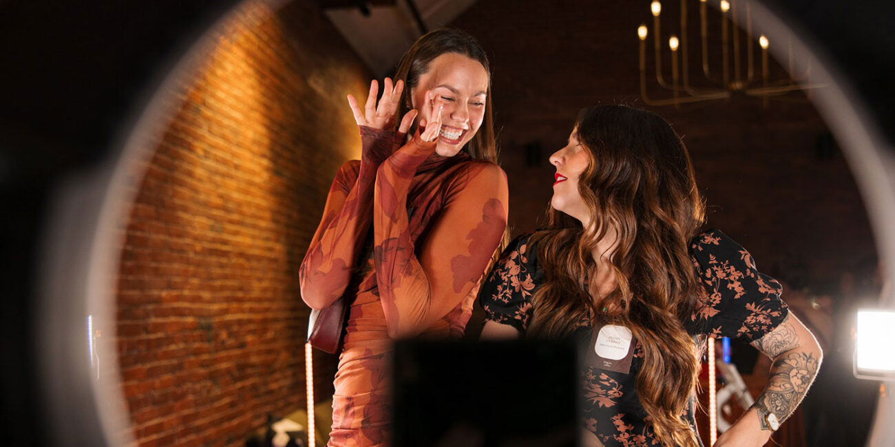 Guests posing in camera station