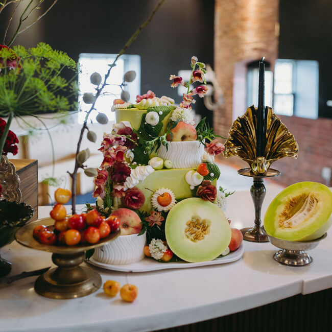 Beautiful cake decorated with fruit and florals