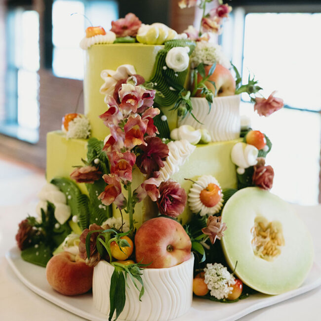 Beautiful cake decorated with fruit and florals