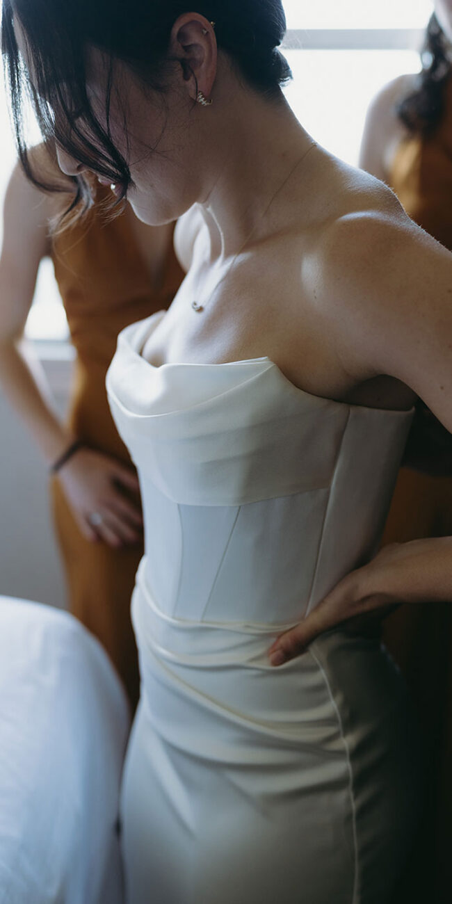 Bridal gown getting ready