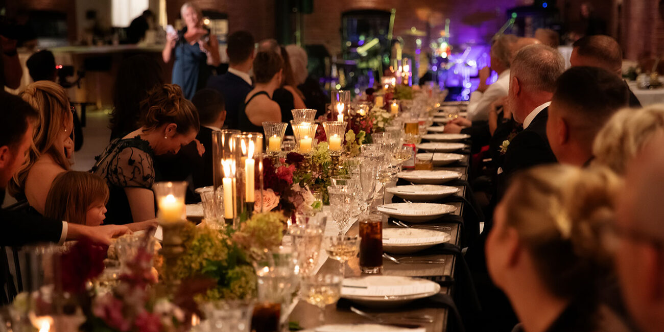 Guests at a long reception table