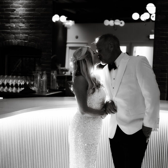 Bride and groom kissing