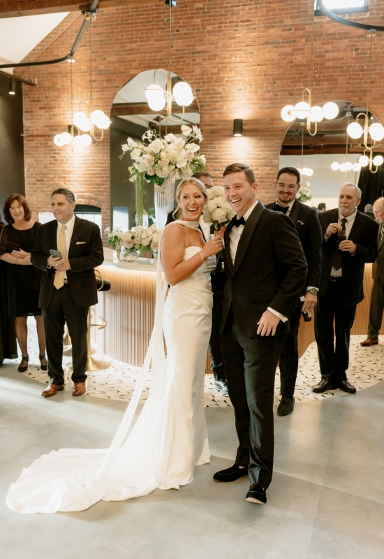 Bride and groom smiling