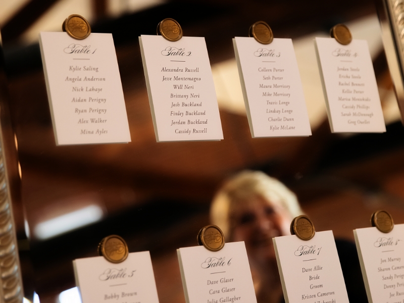 Place card seating chart on mirror