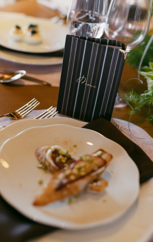 Catered plate of food and menu on table, The Hawthorn