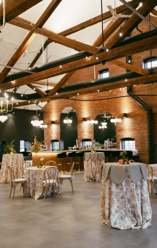 Tall tables in The Hawthorn during daytime event