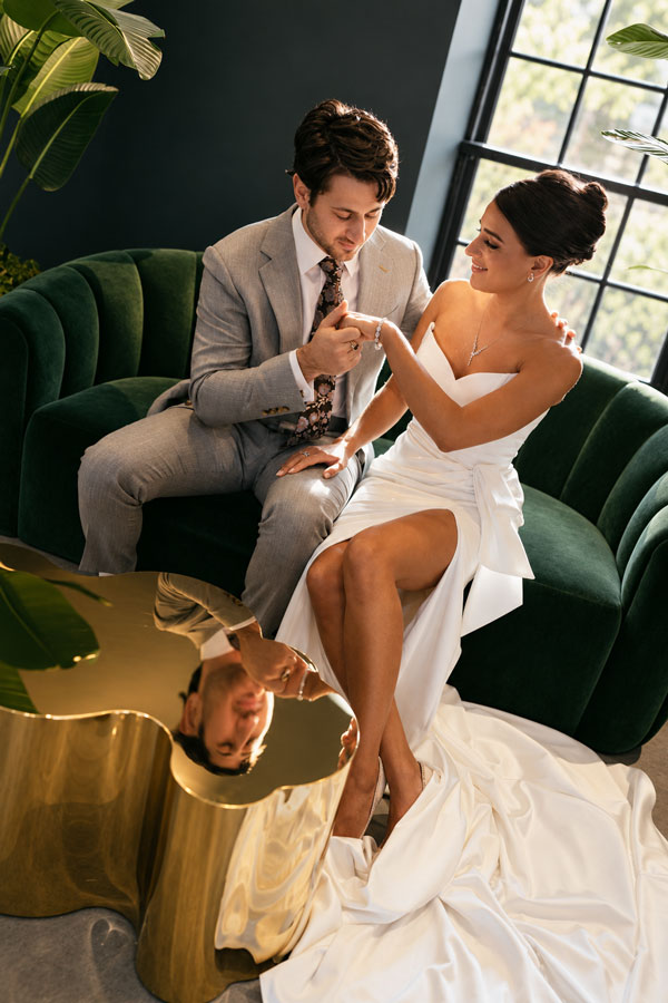 Couple relaxing on the couch at The Hawthorn