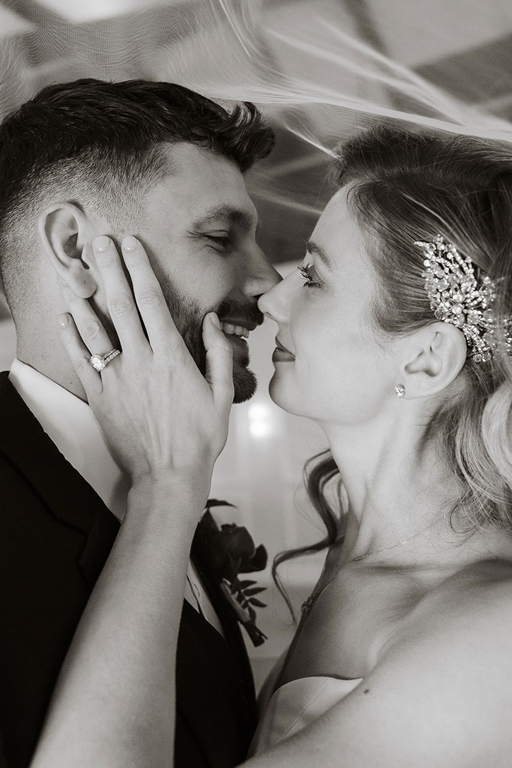 Bride kissing groom